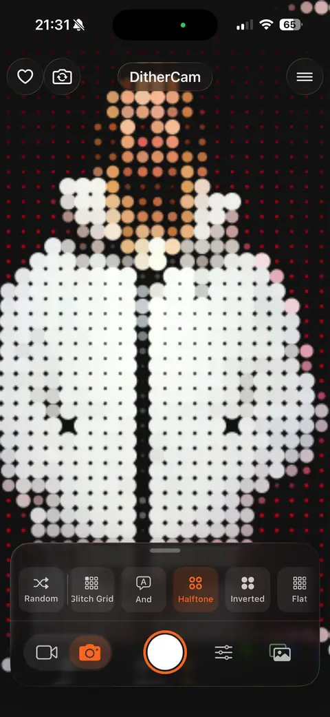 Halftone dots lighting up against black